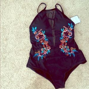 Sexy one piece swimsuit. Size large. NWT.